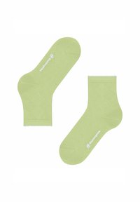 Grüne Socken mit einem strukturierten Rautenmuster, gerippten Bündchen und weißer Logo-Anbringung an der Seite. Weiches Material, niedrig geschnittenes Design.