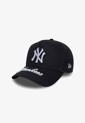 Black baseball cap made of fabric with a curved brim, featuring a white embroidered logo and "Yankees" stitching on the front.