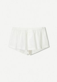 Shorts en lin blanc à coupe décontractée, avec une taille élastique et trois boutons à l'avant. Texture lisse, ouvertures de jambes carrées.