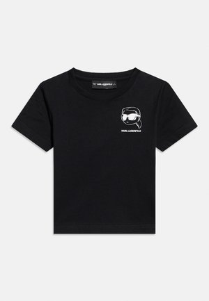 Black short-sleeve t-shirt with a small white graphic of a face wearing sunglasses and the text "KARL LAGERFELD" on the left chest.
