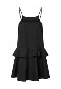 Must mustrik, millel on õhukesed rihmad, tihe kehaosa ja volangiga äär. Valmistatud pehmest kangast, millel on sile tekstuur ja voolav siluett.