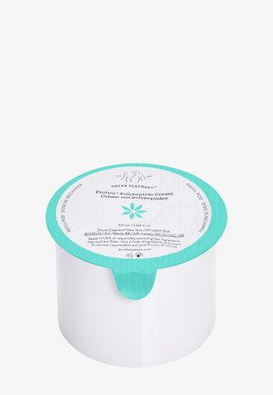 White cylindrical cream container with a teal lid; label details product name, volume, and a floral graphic. Smooth texture.