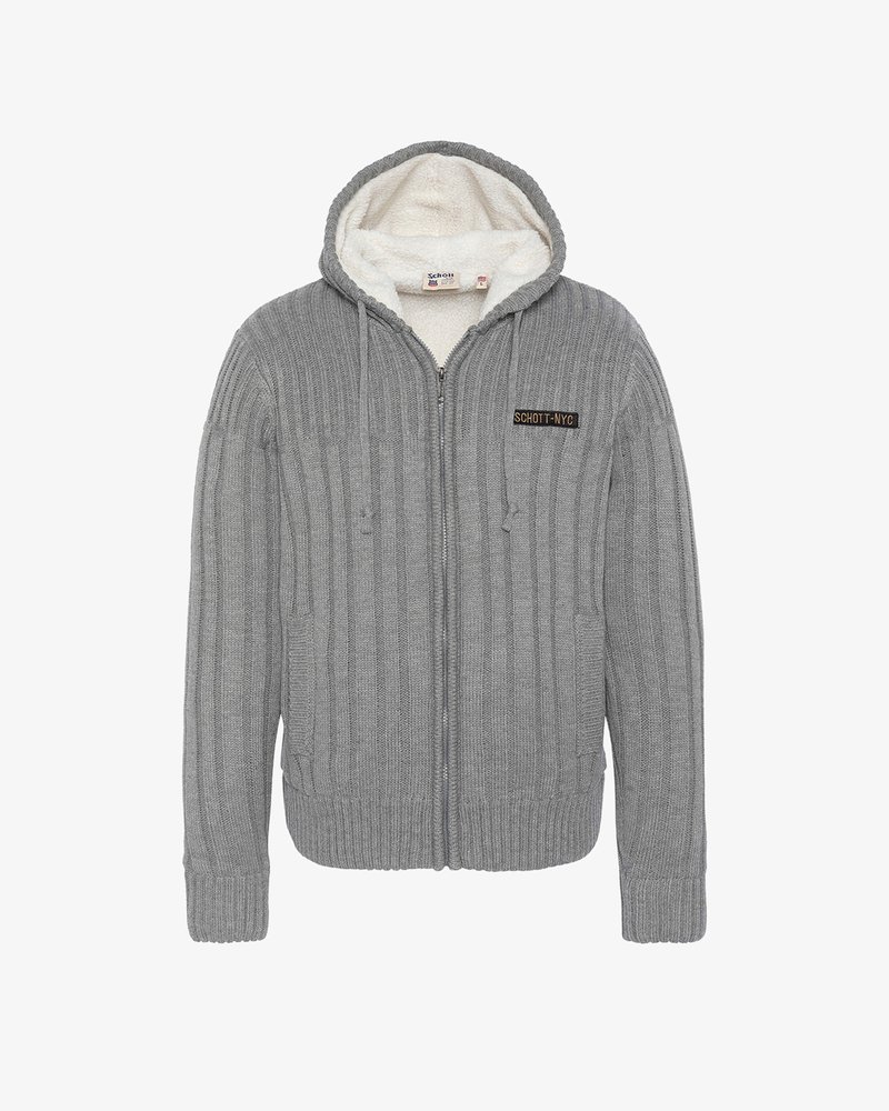 Grijze geribbelde zip-up hoodie met een witte fleece voering, voorzien van een logo patch aan de voorkant. Heeft een capuchon en twee zijzakken.