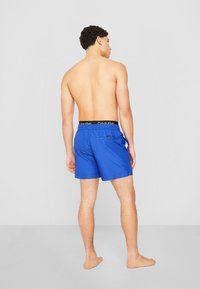 Calvin Klein Swimwear MEDIUM DOUBLE - Zwemshorts - mid azure blue