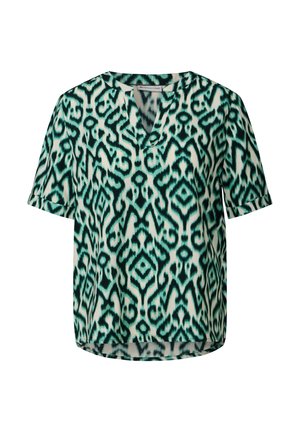 Blouse à manches courtes avec un motif abstrait bleu-vert et blanc, décolleté en V, et une coupe légèrement plus ample avec un ourlet arrondi.