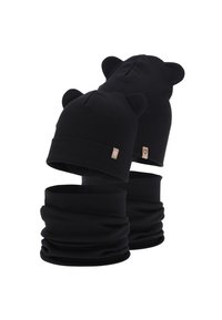 Beanie nero a coste con dettagli a forma di orecchie di orso e scaldacollo nero abbinato. Presenta un piccolo marchio di colore chiaro. Texture morbida.
