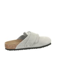 Gray slip-on sandal with textured upper, cork footbed, soft interior lining, and contrasting black rubber sole. Features crossed straps.