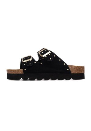 Sandalias de ante negro con dos hebillas ajustables, remaches dorados y una plantilla de corcho texturizada. Cuenta con una suela ondulada para mayor agarre.