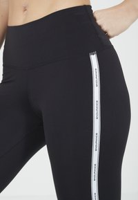 Endurance SADIYA - Tights - 1001 black
