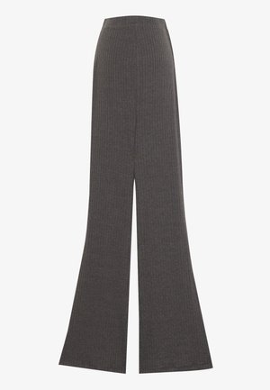 Ribbed wide-leg pants in dark gray. High-waisted design with a soft texture. Floor-length style with a loose fit and no visible hardware.