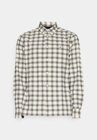 Camicia a maniche lunghe a quadri in crema e blu navy, con colletto button-down, texture del tessuto e piccolo logo sul petto.