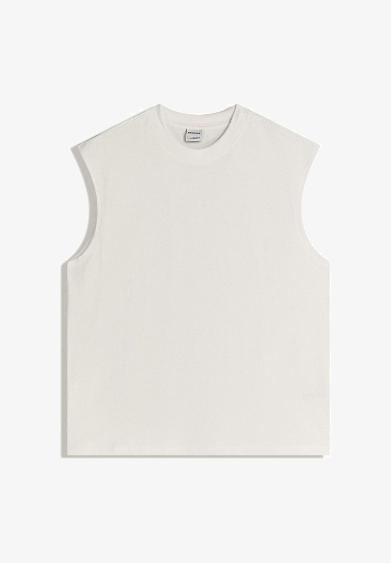 Ärmelloses weißes Baumwolltop mit rundem Ausschnitt und leicht gepolsterten Schultern, flach auf einem weißen Hintergrund liegend.