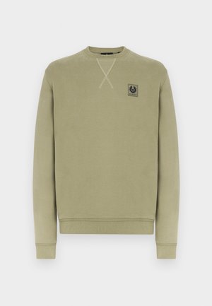 Olivgrön sweatshirt med rund hals, tillverkad av bomullsblandning. Har ribbstickade ärmslut och fåll samt en logotypplatta på bröstet och korsstygnsdetalj.