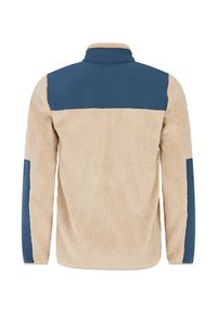 Beige fleecová bunda s modrým ramenním dílem a modrými záplaty na rukávech, prezentována zezadu na bílém pozadí.