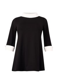 Schwarze Langarmtunika mit weißen umgeschlagenen Manschetten und einem weißen Stehkragen, mit einem lockeren, leicht ausgestellten Schnitt.