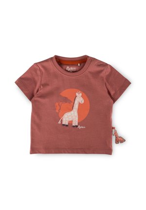 Toddler's short-sleeve rust-colored shirt with a giraffe illustration and matching giraffe keychain hanging on the side.