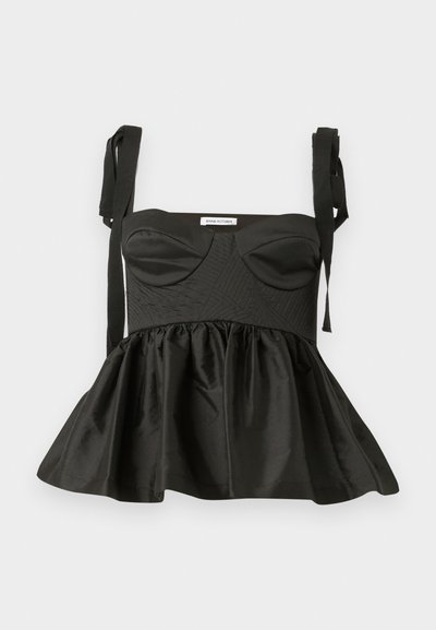 Black peplum top with a structured bodice, sweetheart neckline, textured fabric, and adjustable tie straps. Flared skirt adds volume.