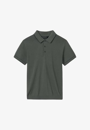 Polo shirt verde scuro realizzato in tessuto morbido, con colletto classico, patta con tre bottoni e rifiniture a contrasto sulle maniche.