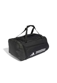 Svart treningsbag med to topphåndtak, glidelås-lukking, frontlomme og hvit stripete logodesign på siden. Laget av slitesterkt, teksturert materiale.