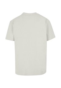 Lys grå kortærmet T-shirt med rund hals; blødt bomuldsstof; glat tekstur uden synlige mønstre eller detaljer.