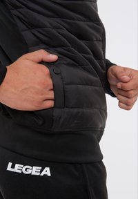 LEGEA Übergangsjacke - nero