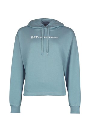 Jasnoniebieska bluza z kapturem, ze ściągaczami i nadrukiem "EA7 Emporio Armani" na piersi w białym kolorze, z długimi rękawami i krótkim krojem.