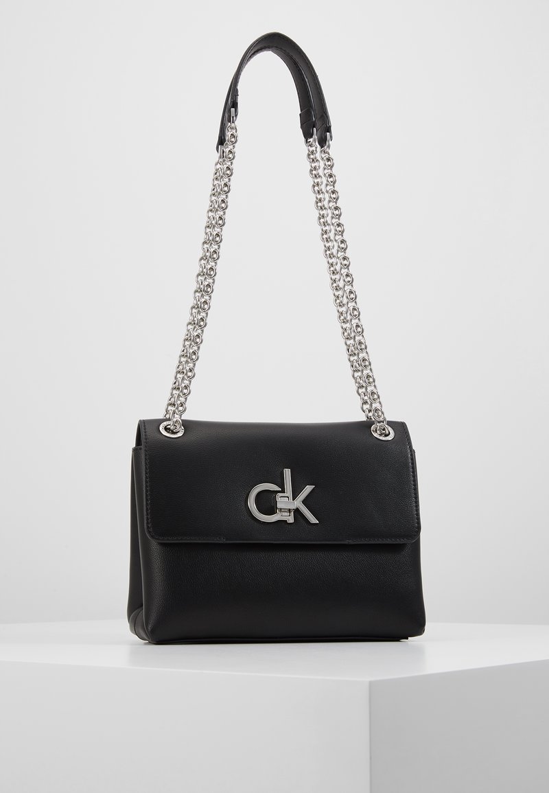 Calvin Klein RE LOCK CROSSBODY Across body bag black Zalando.ie