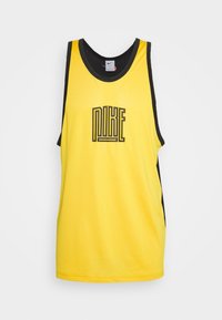 Débardeur de sport jaune avec des accents noirs, présentant un logo "NIKE" noir bien visible sur le devant, fabriqué en tissu léger.