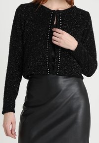 Rich & Royal Neuletakki - black