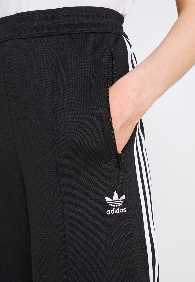 Conmemorativo ducha Nublado adidas Originals TRACK PANTS - Pantalones deportivos - black/negro -  Zalando.es