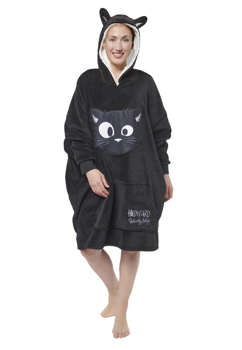Poncho nero con cappuccio e design a faccia di gatto, realizzato in morbido materiale in felpa e dotato di tasche. Presenta accenti a forma di orecchie e un nome di marca ricamato sull'orlo.