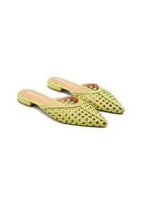 Green woven mules with a pointed toe and a low, block heel. Textured material with cut-out patterns and a brown inner lining.