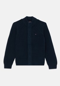 Cardigan en maille épaisse bleu marine avec col, poignets et ourlet côtelés, doté de boutons dissimulés et d'un petit logo sur la poitrine.