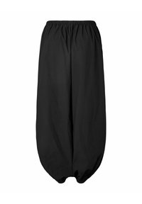 Melnas, vieglas bikses ar elastīgu vidukli un sašaurinātu dizainu. Mīksta tekstūra, ar sapīnētiem potīšu galiem, veidojot balona siluetu.