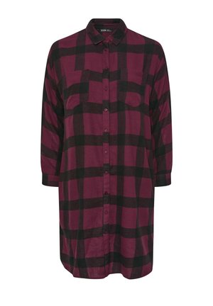 Camicia a maniche lunghe, con bottoni, di colore bordeaux con motivo a quadri neri. Presenta due tasche sul petto e un colletto classico. Tessuto con una texture morbida.
