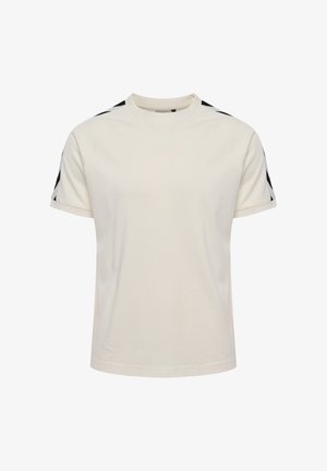 Cremefarvet bomulds T-shirt med korte ærmer, prydet med sorte designelementer på skuldrene og en rund halsudskæring. Glat tekstur.