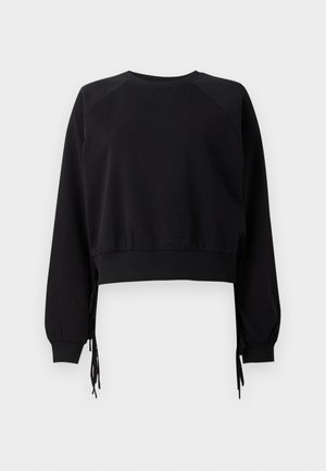 Felpa nera corta con maniche raglan lunghe, scollatura a costine e lacci laterali regolabili per la vestibilità. Realizzata in morbido tessuto testurizzato.