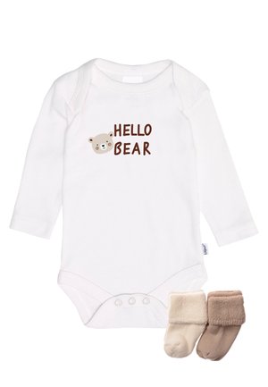 White long-sleeve baby bodysuit with "HELLO BEAR" text and bear face, paired with two soft folded socks in cream and light brown.
