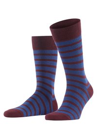 Medias a rayas con colores marrón y azul, con una parte superior acanalada y una textura suave. El diseño incluye rayas horizontales de diferentes anchos.