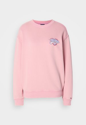 Pink sweatshirt with a crew neck, ribbed cuffs, and a small embroidered "Tommy" logo on the chest. Soft cotton material.