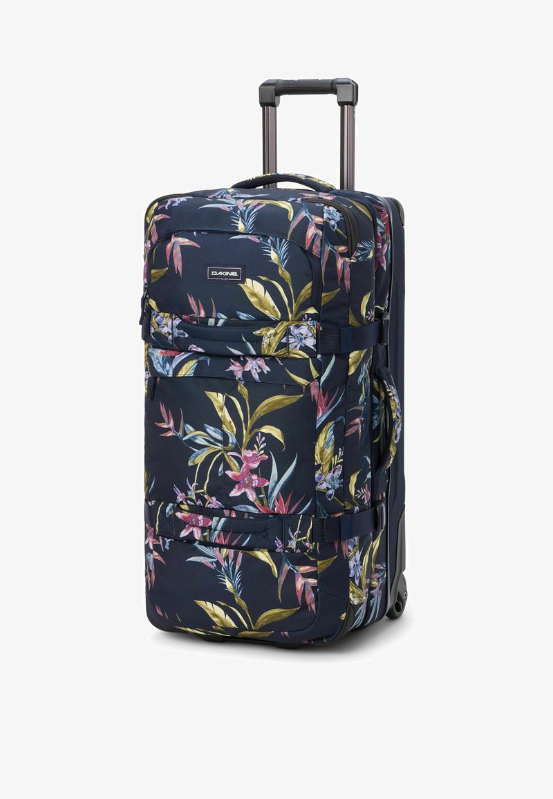 Valise à roulettes avec poignée télescopique, tissu foncé avec imprimé floral tropical coloré, poches avant et latérales, et sangles de compression doubles.