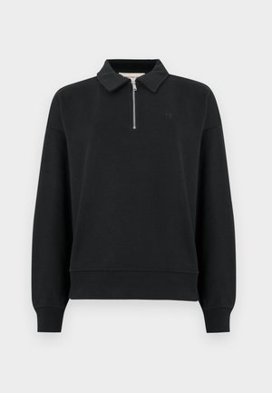 Μαύρο φούτερ με φερμουάρ στον γιακά, με μακριά μανίκια, ριμπ μανσέτες και μικρό λογότυπο στο μπροστινό μέρος. Μαλακή, ομαλή υφή υφάσματος.