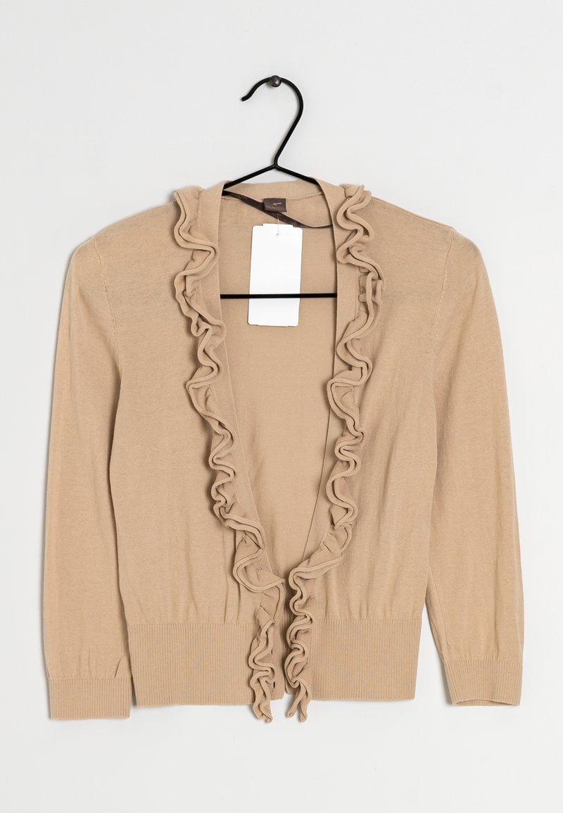 Cardigan beige con un'apertura arricciata frontale, maniche lunghe e polsini e orlo a coste. Il tessuto appare morbido con una texture liscia. Etichetta attaccata.