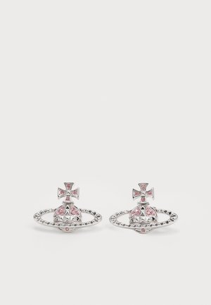 Silver stud earrings shaped like an orb with a ring, adorned with pink gemstones and a cross on top, against a plain white background.