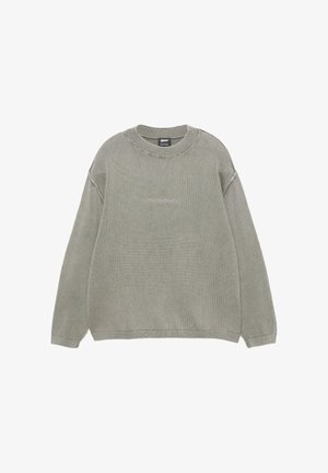 Legénnyakú, olívazöld kötött pulóver hosszú ujjal, bordázott mandzsettával és szegéllyel, egyszínű kivitelben.