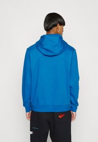 Nike Sportswear SPORTSWEAR CLUB FLEECE - Sweatshirt com capuz - dark marina blue/white