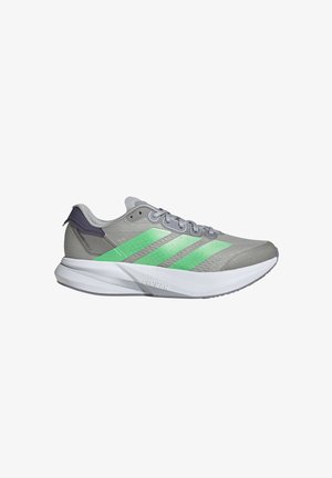 Light gray running shoe with light green stripes, white sole labeled "Lightstrike," and dark gray heel accent.