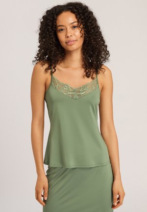 Green camisole with lace detailing at the neckline, featuring thin straps and a flowy shape. Soft fabric with a smooth texture.