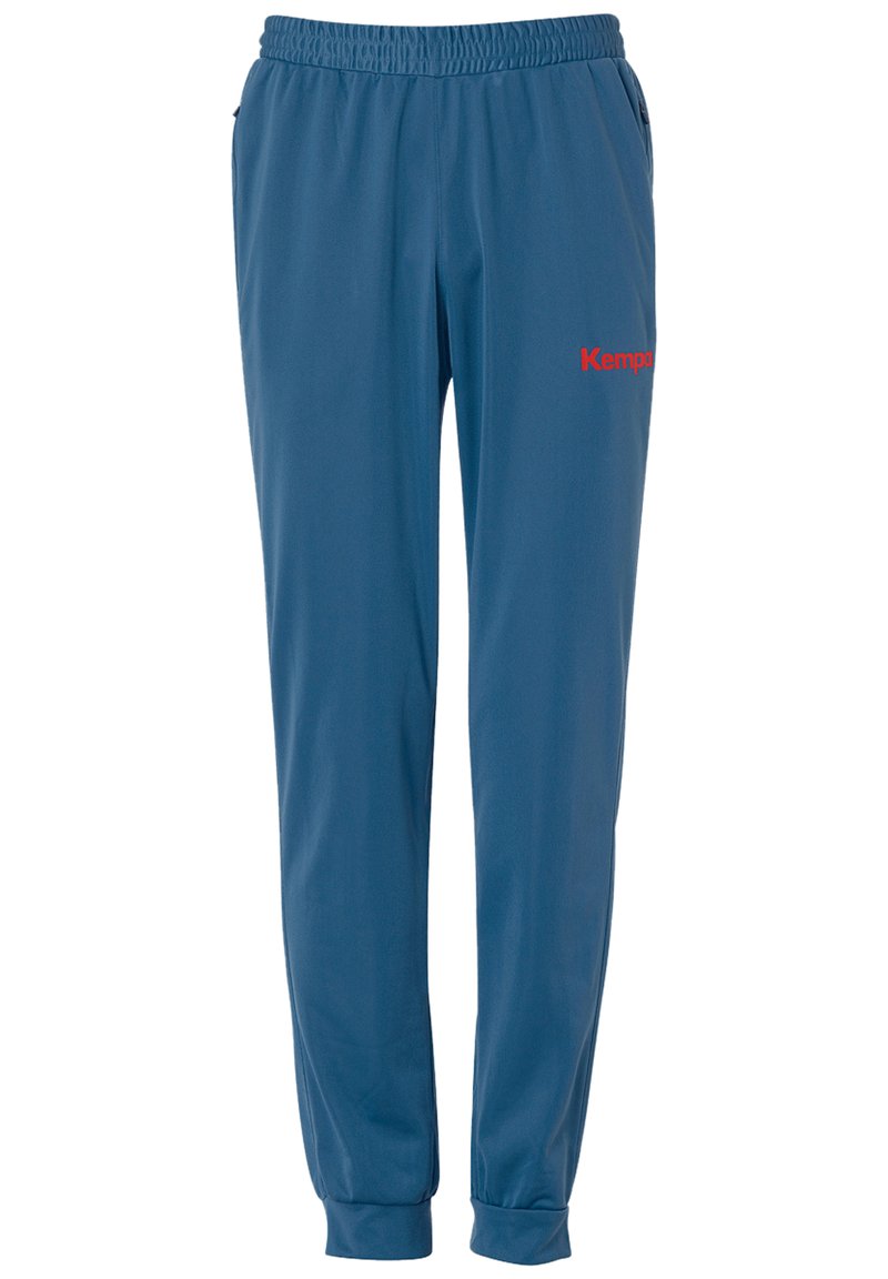 Blå sportsbukser med elastisk talje, tapered manchetter og et rødt "Kemp" logo på forsiden. Glat stof med en let tekstur.