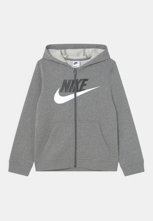 Felpa grigia con zip in misto cotone, con logo Nike bianco sul davanti, tasche a marsupio e cappuccio con coulisse.